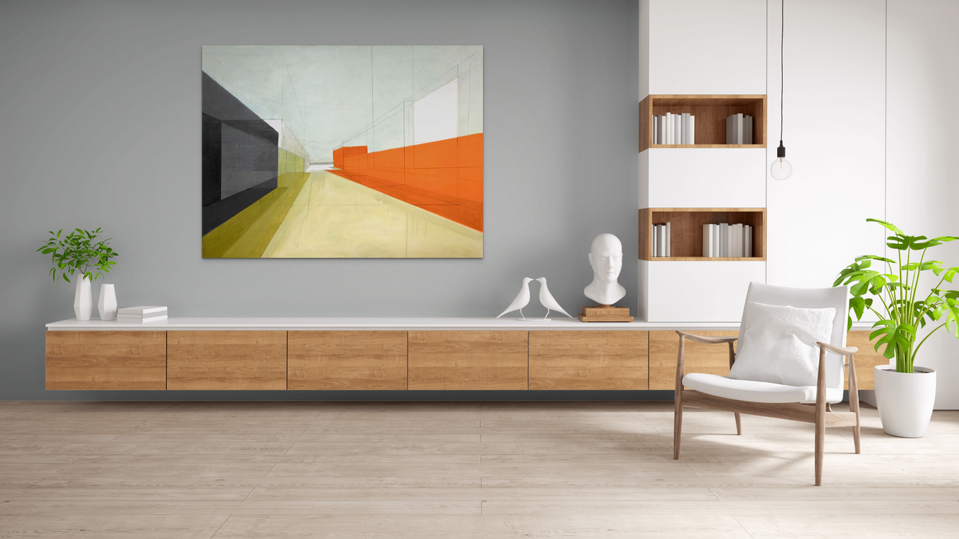 A collage paiting of an abstract city scene hung in a modern living room